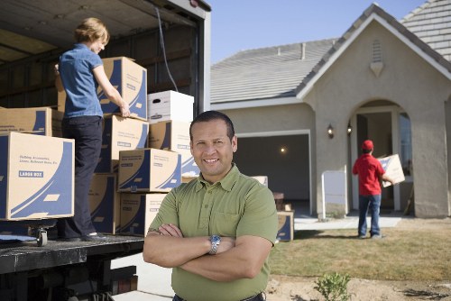 Removalists packing and transporting household items