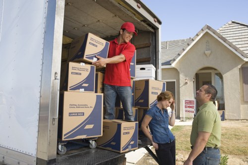 Eco-friendly moving van loaded with belongings